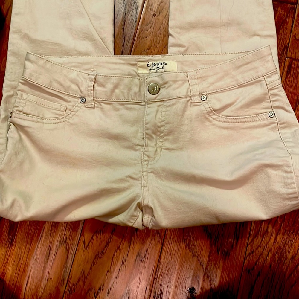 d. Jeans cream colored pants